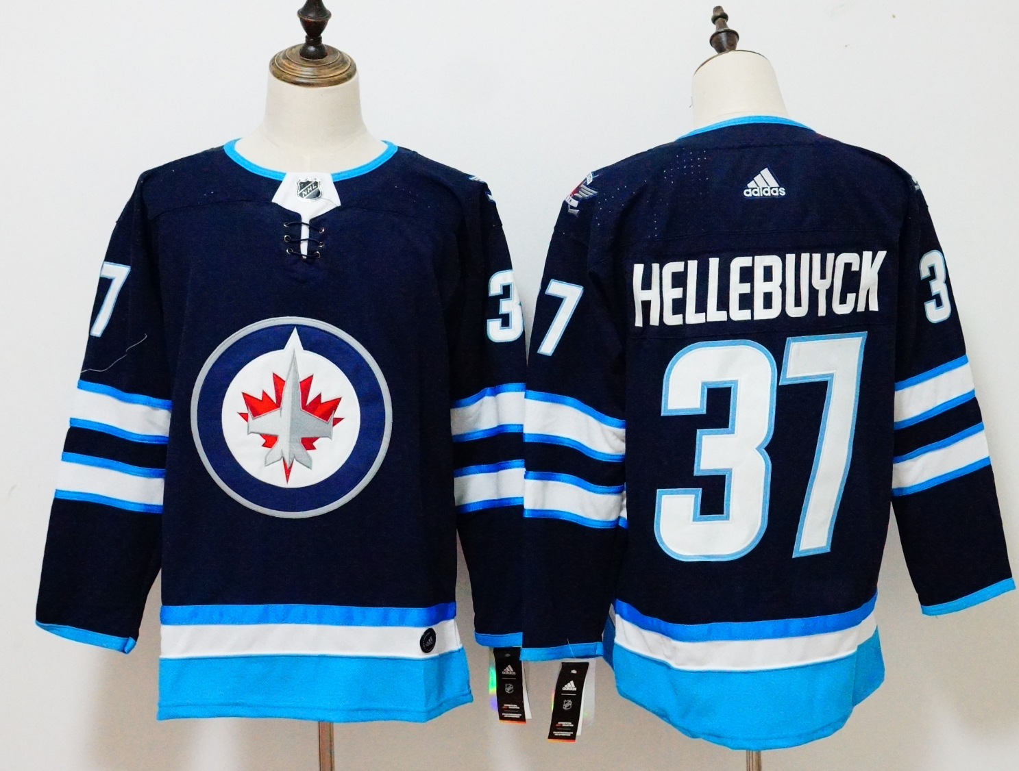 Men's Adidas Winnipeg Jets #37 Connor Hellebuyck Navy Stitched NHL Jersey